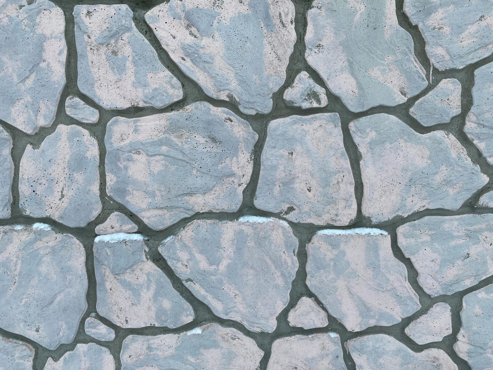a close up view of a stone wall